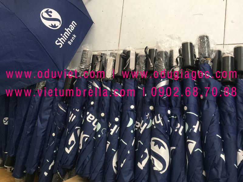 xưởng sản xuất ô dù cầm tay in logo quảng cáo